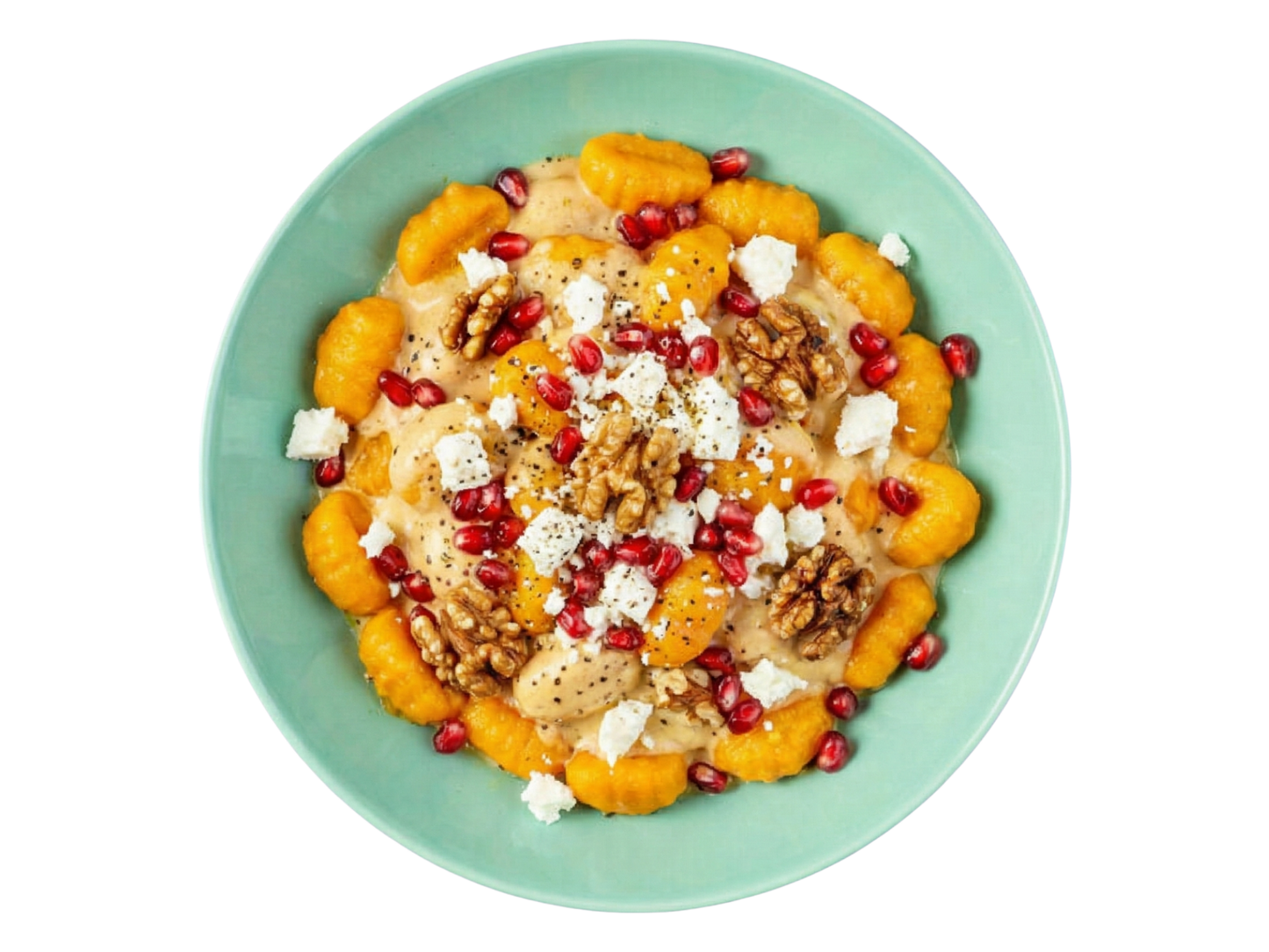 Pumpkin gnocchi with feta, pomegranate and walnuts