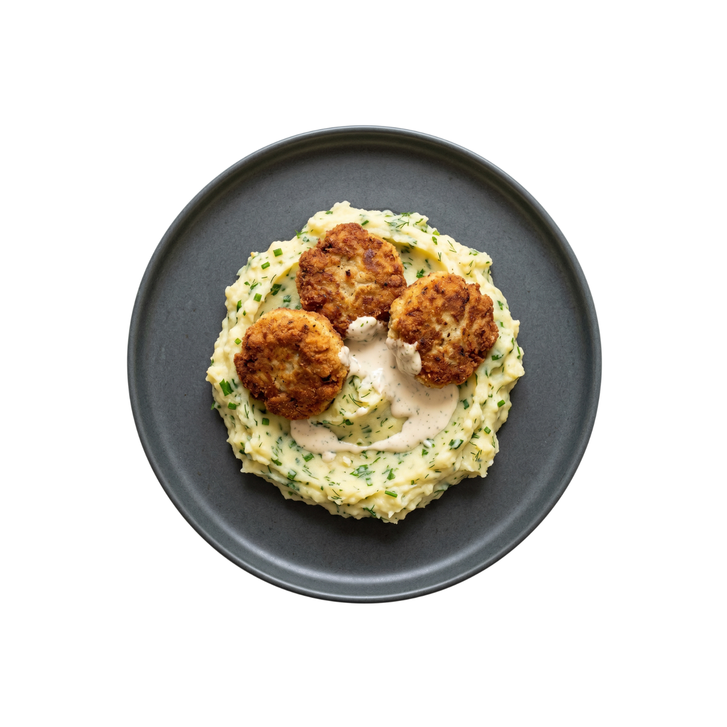 Fischfrikadellen auf Kartoffel-Kräuterpüree mit Knoblauchcreme