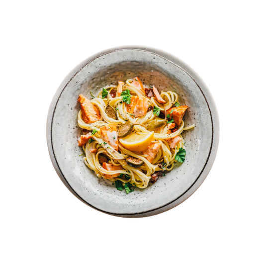 Salmon on fettuccine with dill-mustard sauce